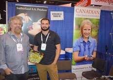 Clive and Max Sutherland with Sutherland, S.A. Produce. Max shows Pristine grapes.